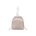 Sac à main beige en polyéthylène de Calvin Klein, design élégant et moderne, avec poignées et fermeture visible.
