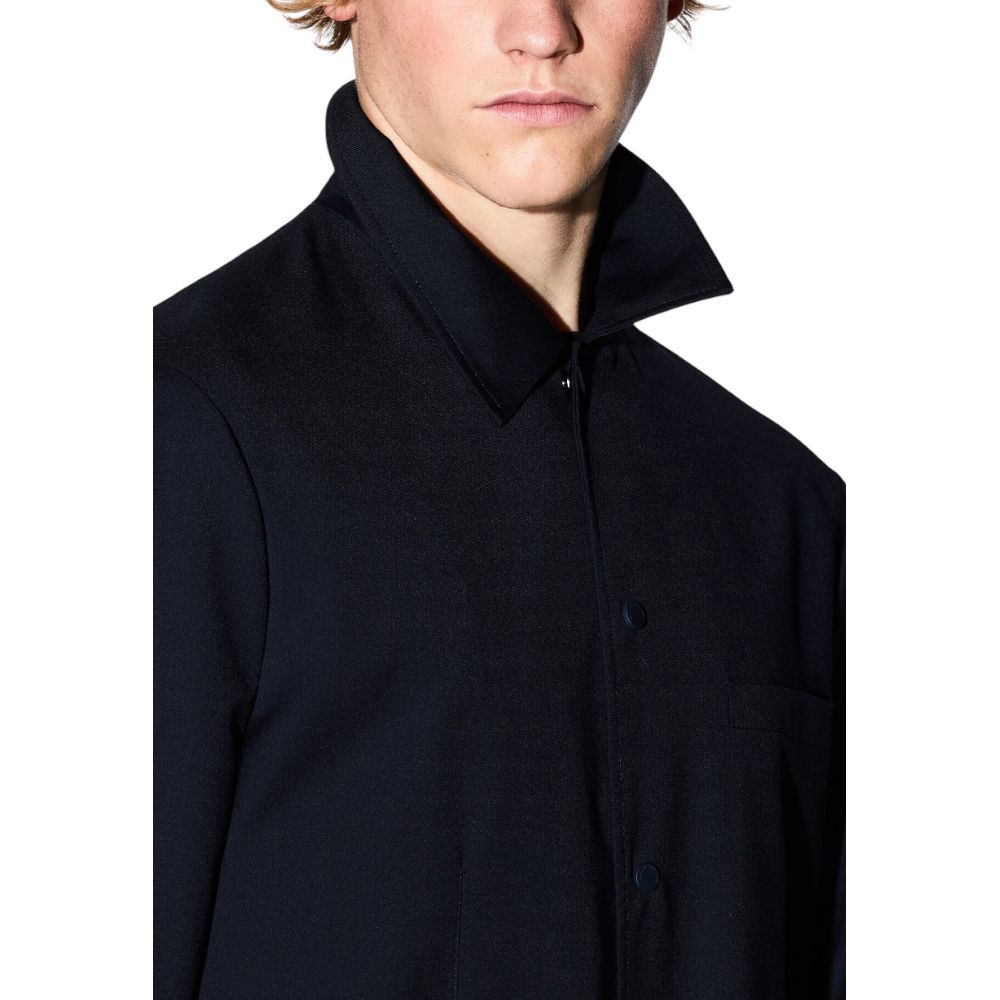 Blazer en polyester noir Armani Exchange pour homme, coupe élégante et moderne, visible avec col et boutons.