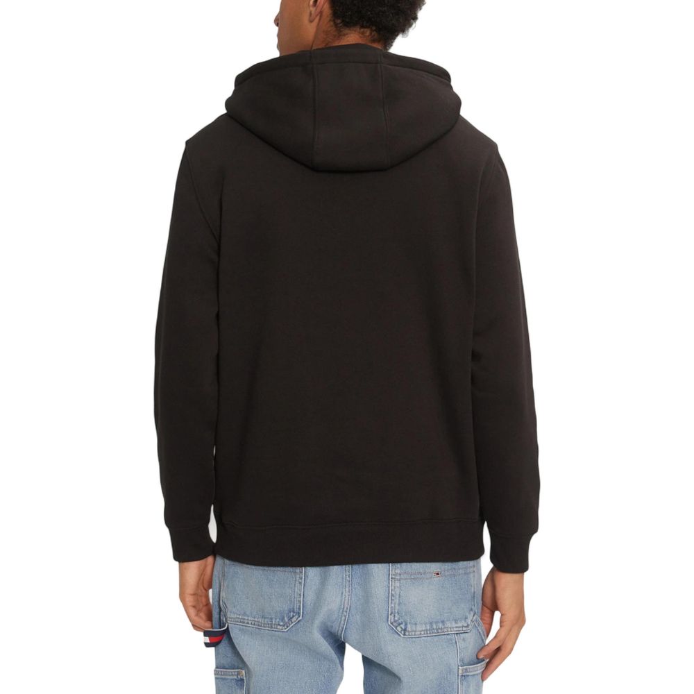 Sweat à capuche Tommy Hilfiger Jeans noir en coton, vue de face, avec logo distinctif sur la poitrine.