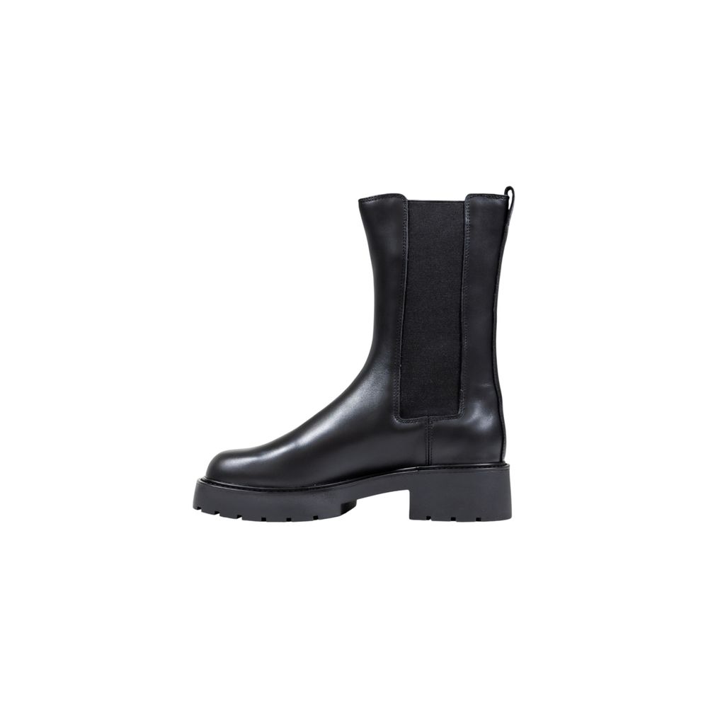 Bottes ankle en cuir noir de Calvin Klein Jeans, style élégants et modernes, visibles sur cette image.