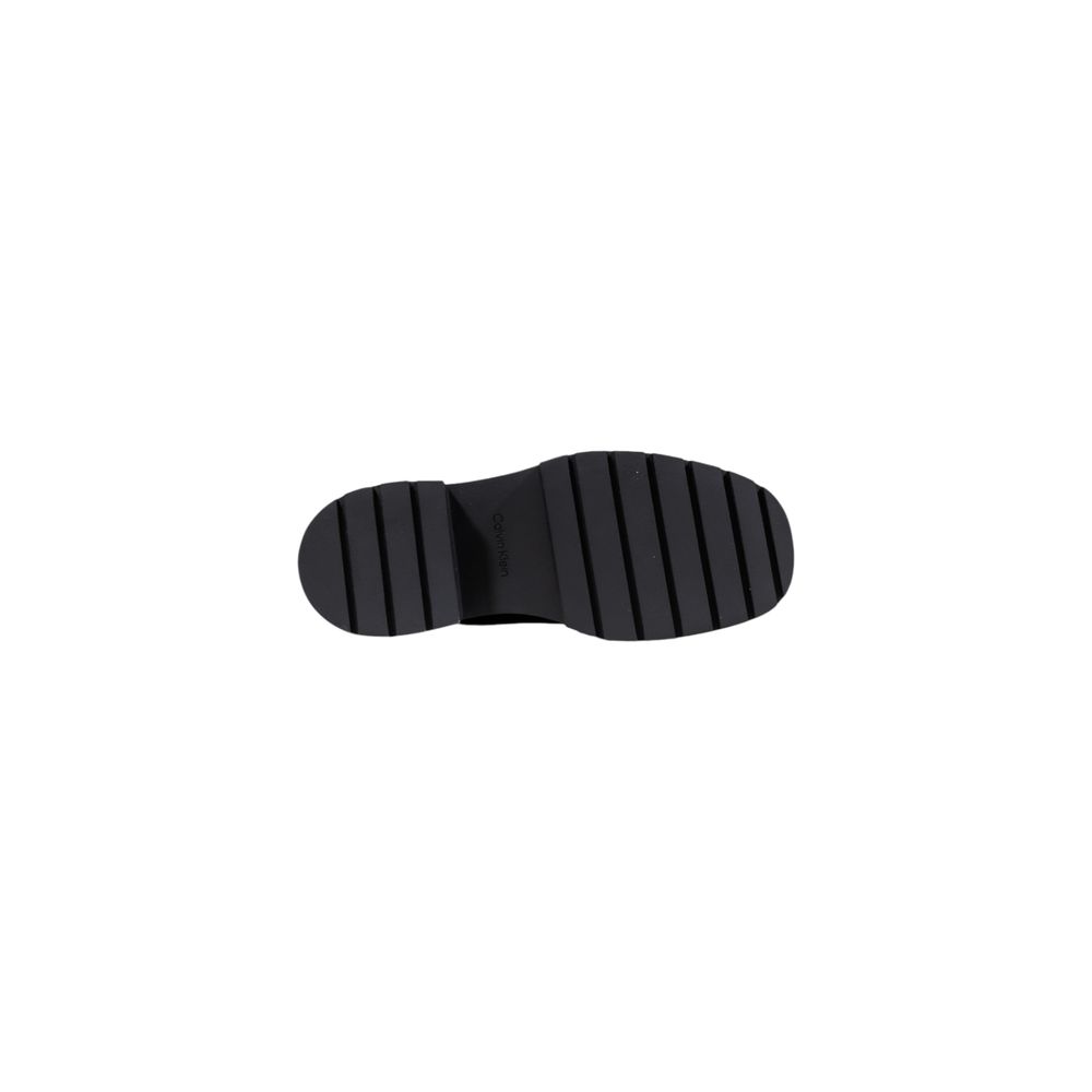 Bottines en cuir noir pour ankle de Calvin Klein Jeans, élégantes et modernes, vues de face avec semelle en caoutchouc.