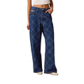 Jean boyfriend en coton bleu de Calvin Klein Jeans, coupe décontractée et style moderne, visible avec poches et fermeture éclair.