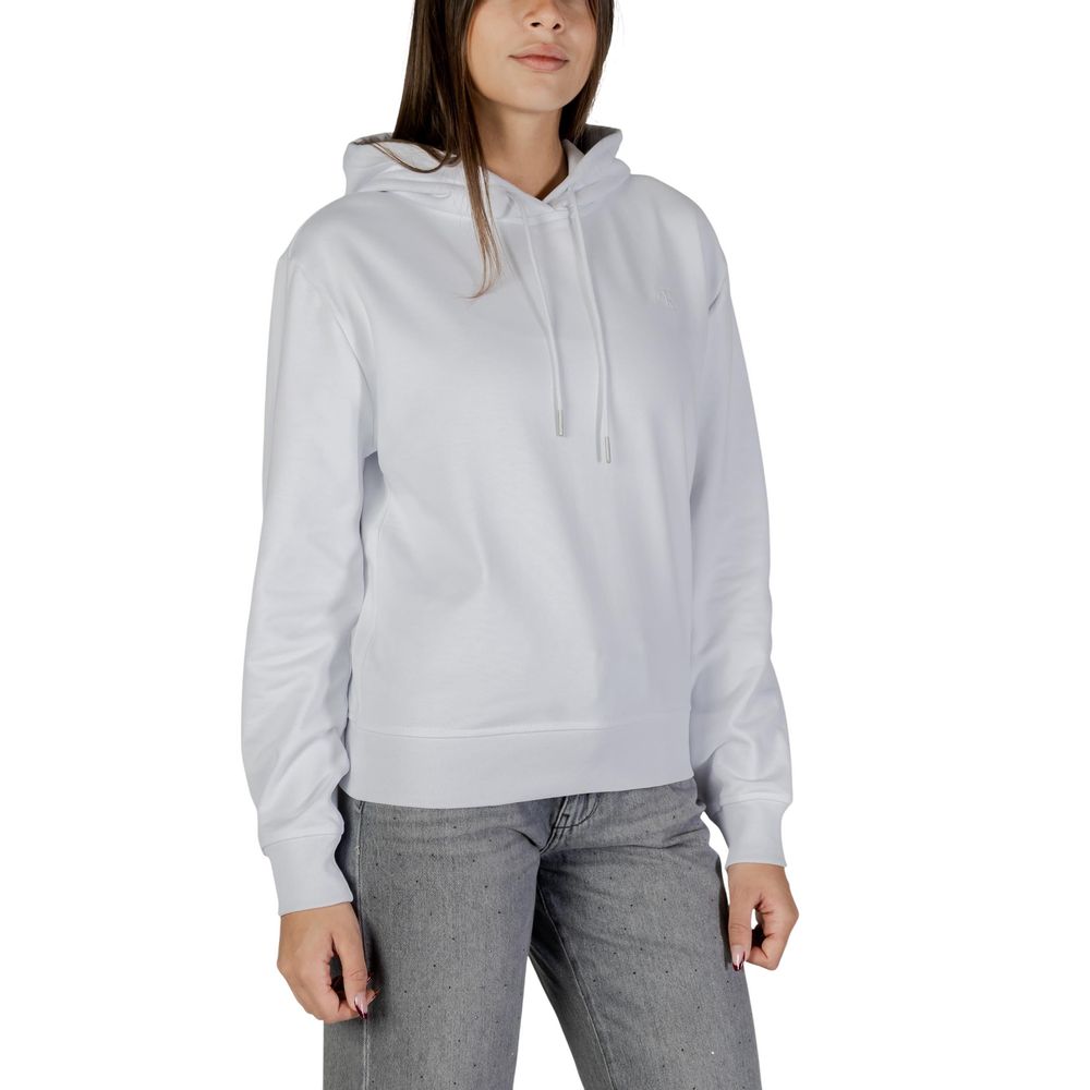 Sweat à capuche blanc en coton de la marque Calvin Klein Jeans, avec logo discret sur la poitrine, porté sur un mannequin.