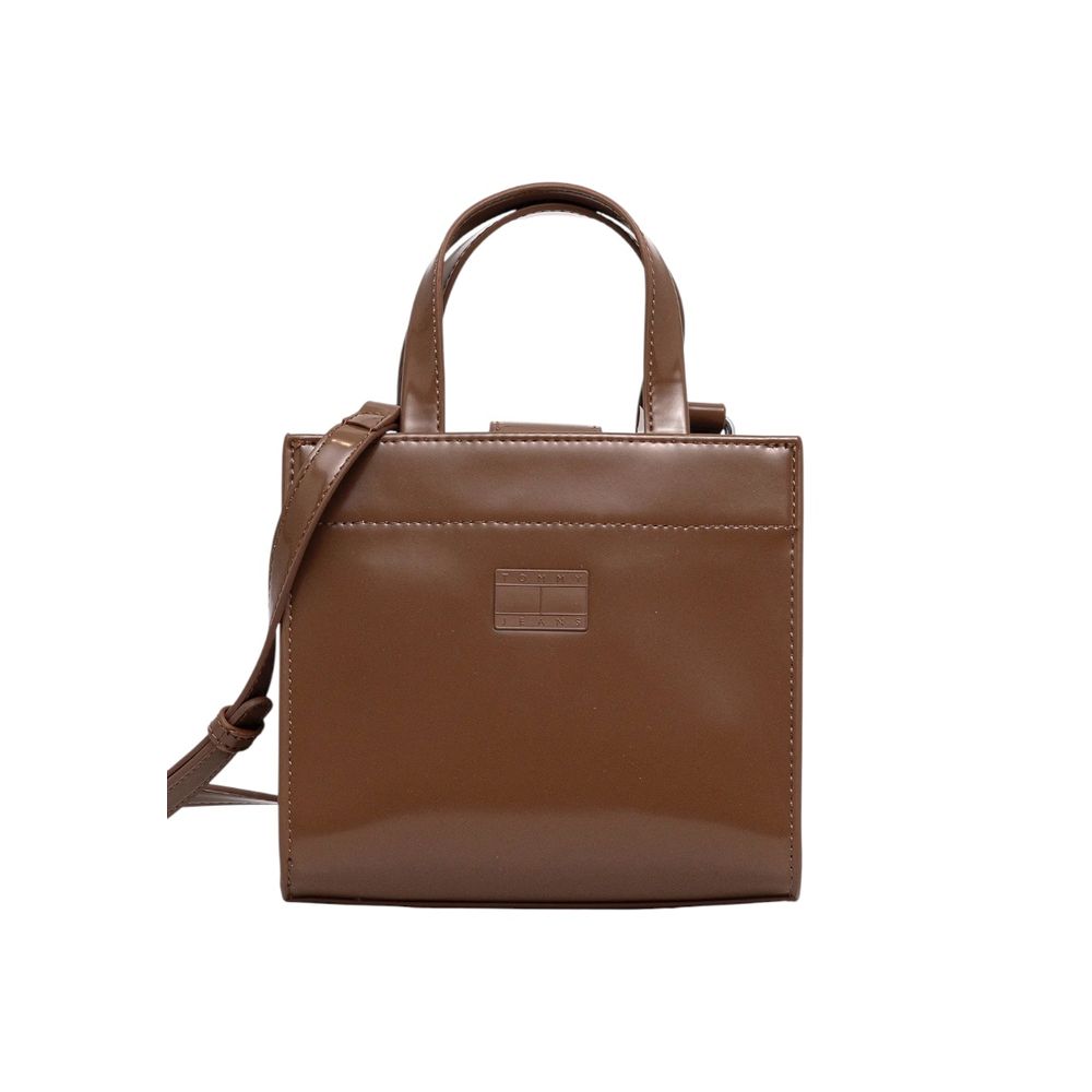 Sac à main Tommy Hilfiger Jeans beige en polyéthylène avec poches et poignées, mode élégante et pratique.