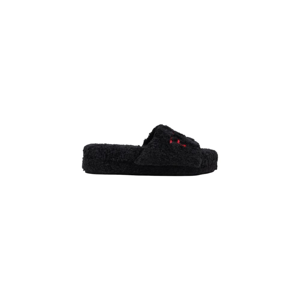 Chaussons en textile noir Ralph Lauren, confortables et élégants, parfaits pour la maison, avec logo Ralph Lauren visible.