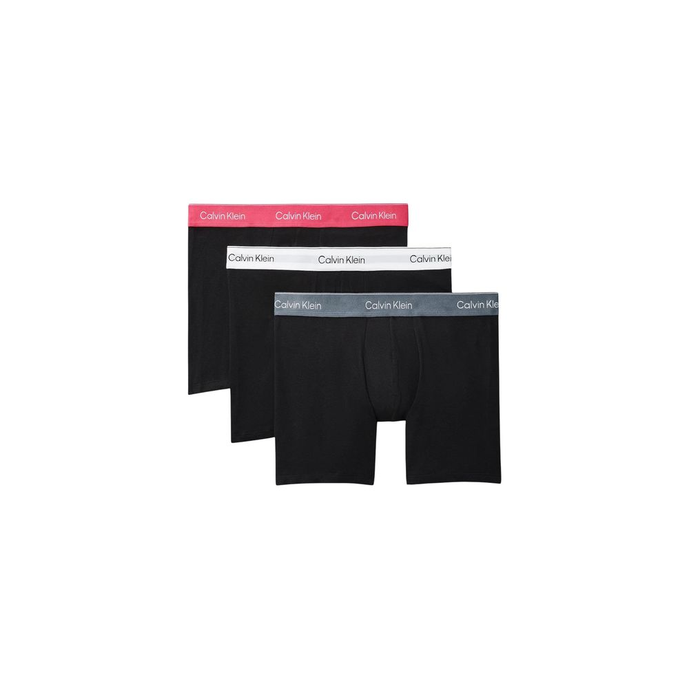 Sous-vêtements boxers en coton rose de Calvin Klein Underwear, coupe confortable et logo visible à la ceinture.