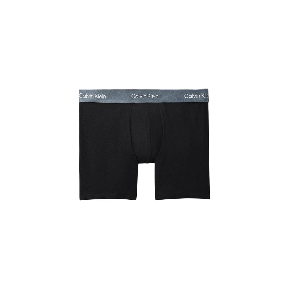 Boxers en coton rose de la marque Calvin Klein Underwear, confortables et masculins, visibles en détail.
