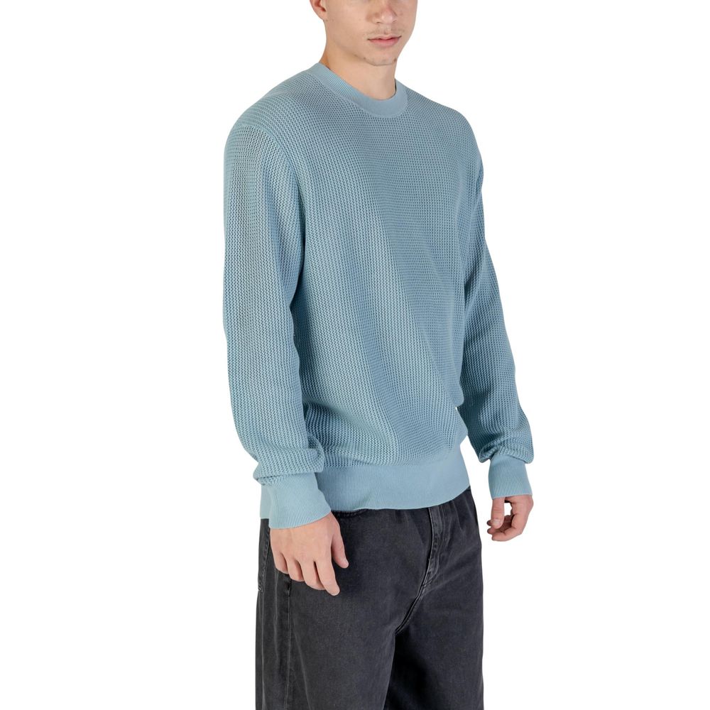 Sweat-shirt en coton bleu de Calvin Klein Jeans, coupe décontractée et logo discret sur la poitrine.