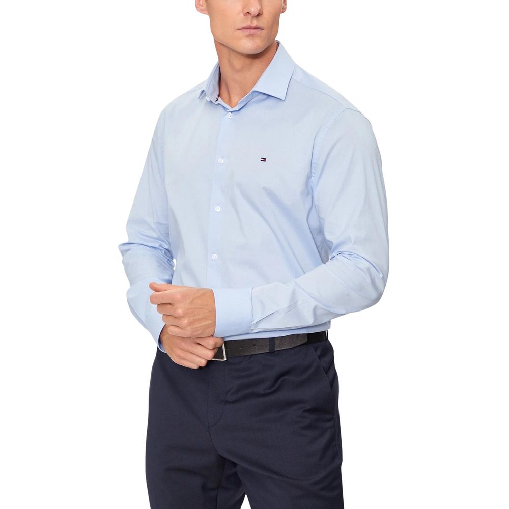 Chemise bleue en coton biologique Tommy Hilfiger, boutonnière classique, col boutonné, tissu doux et respirant pour homme.
