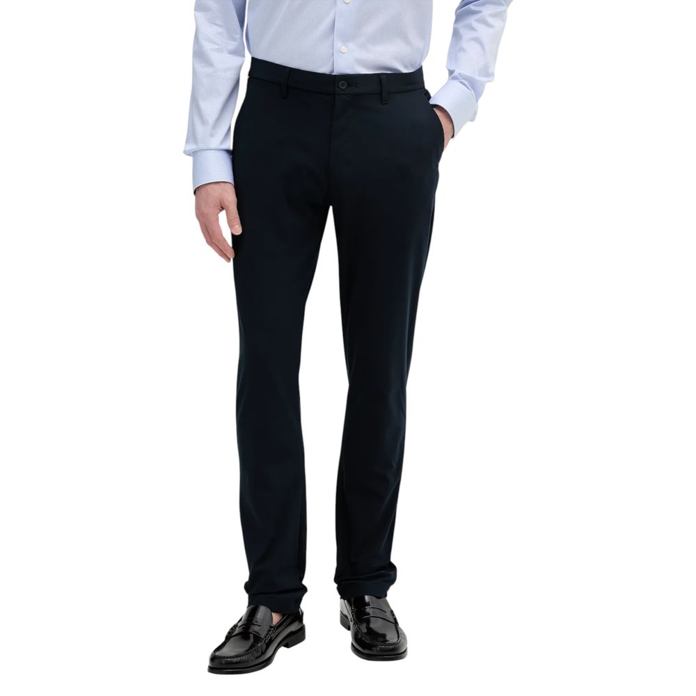 Pantalon décontracté en polyester bleu de Tommy Hilfiger, coupe confortable et style casual pour homme ou femme.