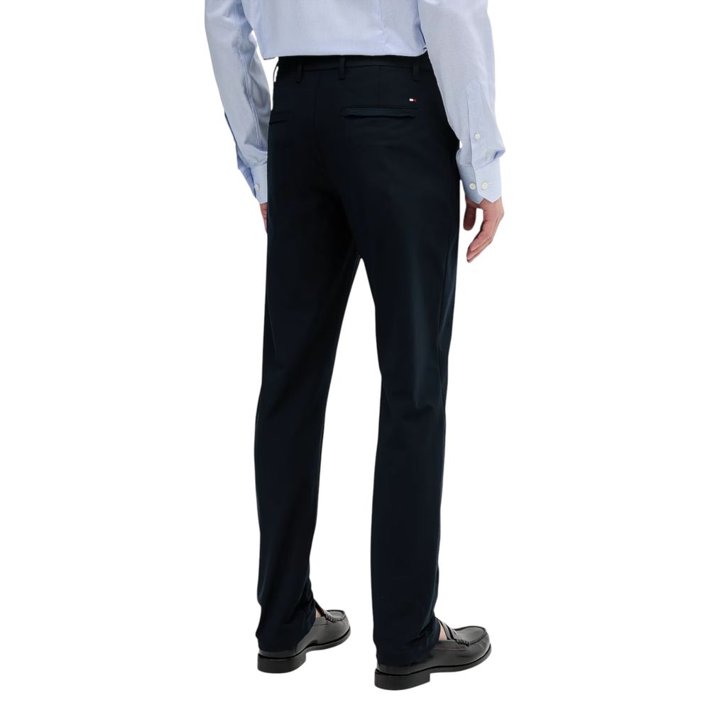 Pantalons décontractés en polyester bleu Tommy Hilfiger, vue de face, avec ceinture et poches visibles.