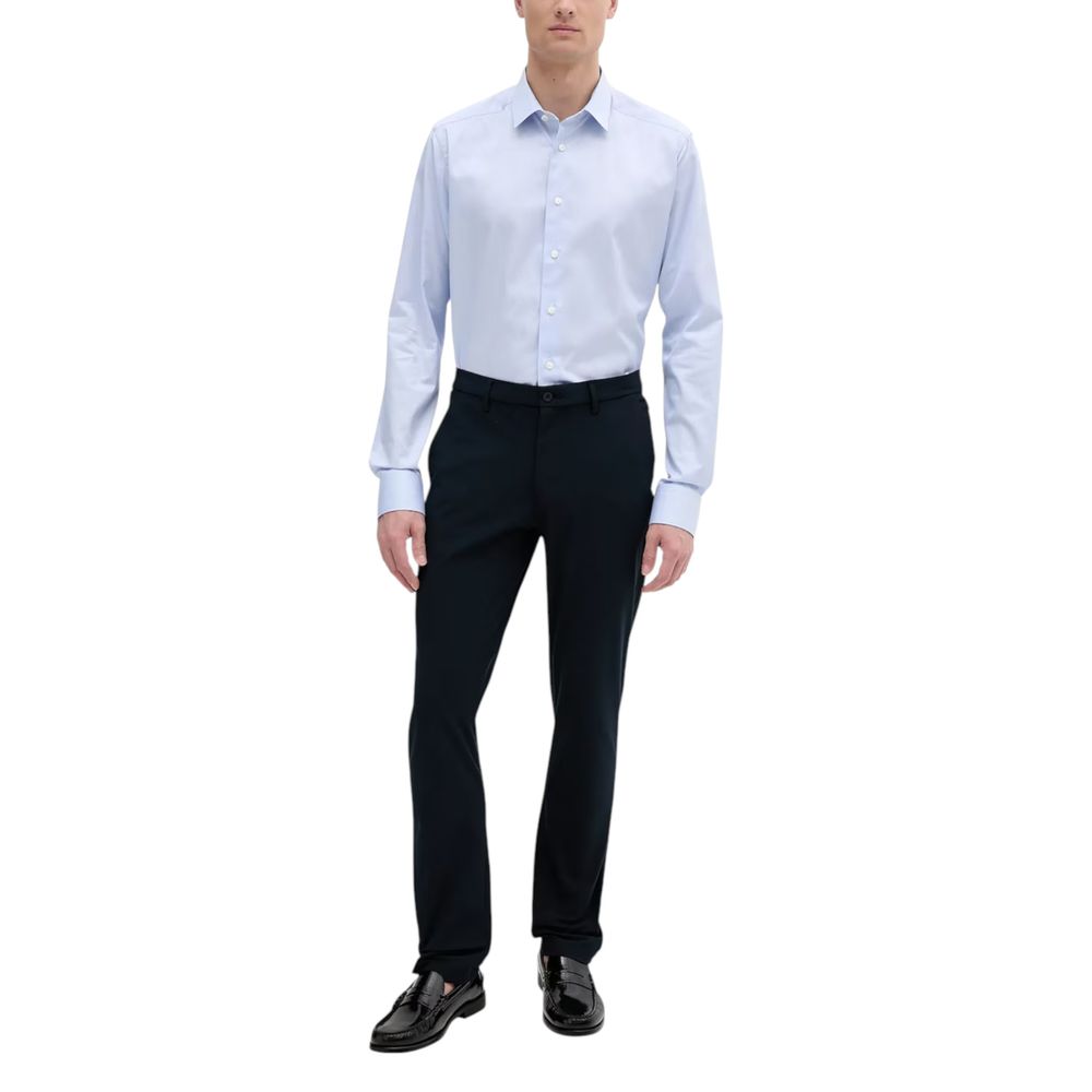 Pantalon décontracté en polyester bleu de Tommy Hilfiger, coupe classique, visible sur un fond neutre.
