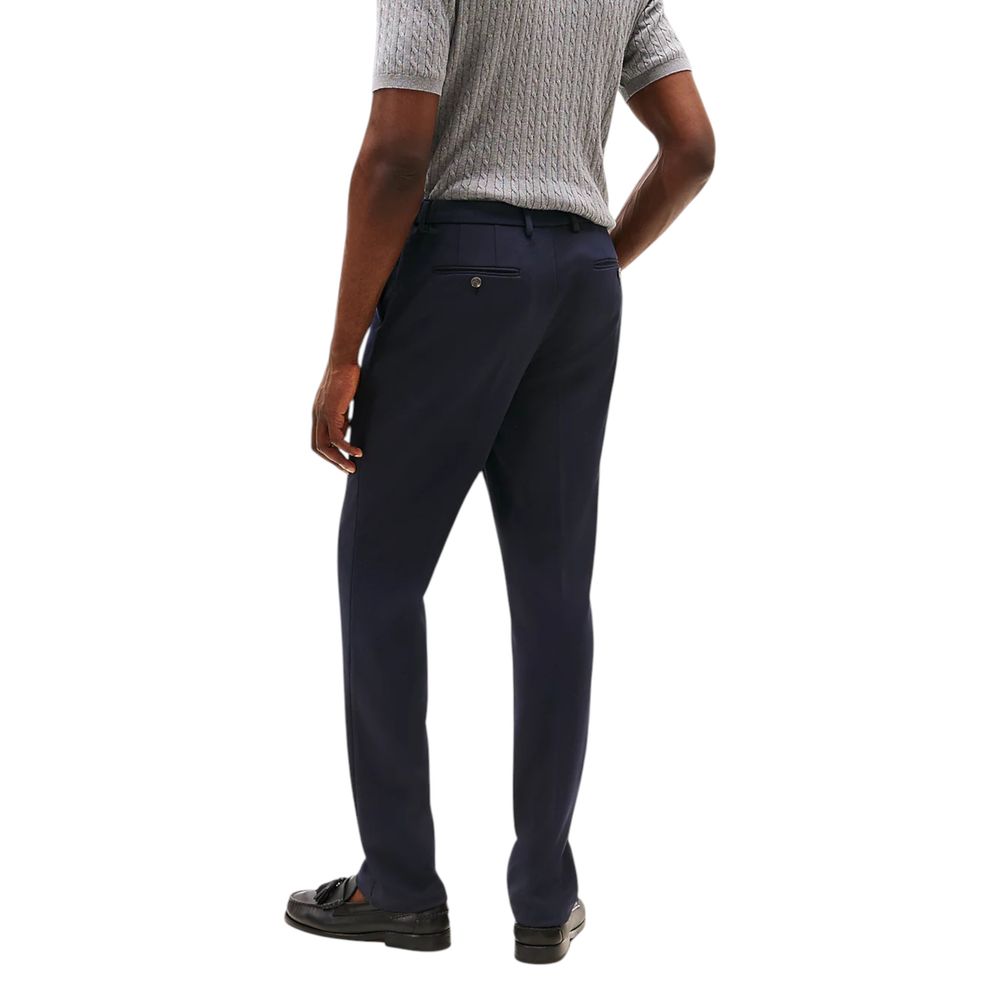 Pantalon de costume en polyester recyclé bleu Tommy Hilfiger pour homme, coupe classique et élégante.
