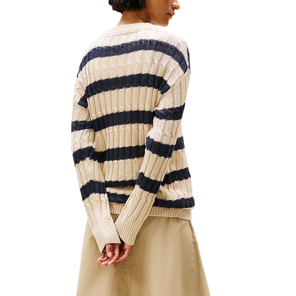 Sweatshirt en lin beige Tommy Hilfiger, coupe décontractée, col rond, manches longues, tissu léger pour un style confortable.