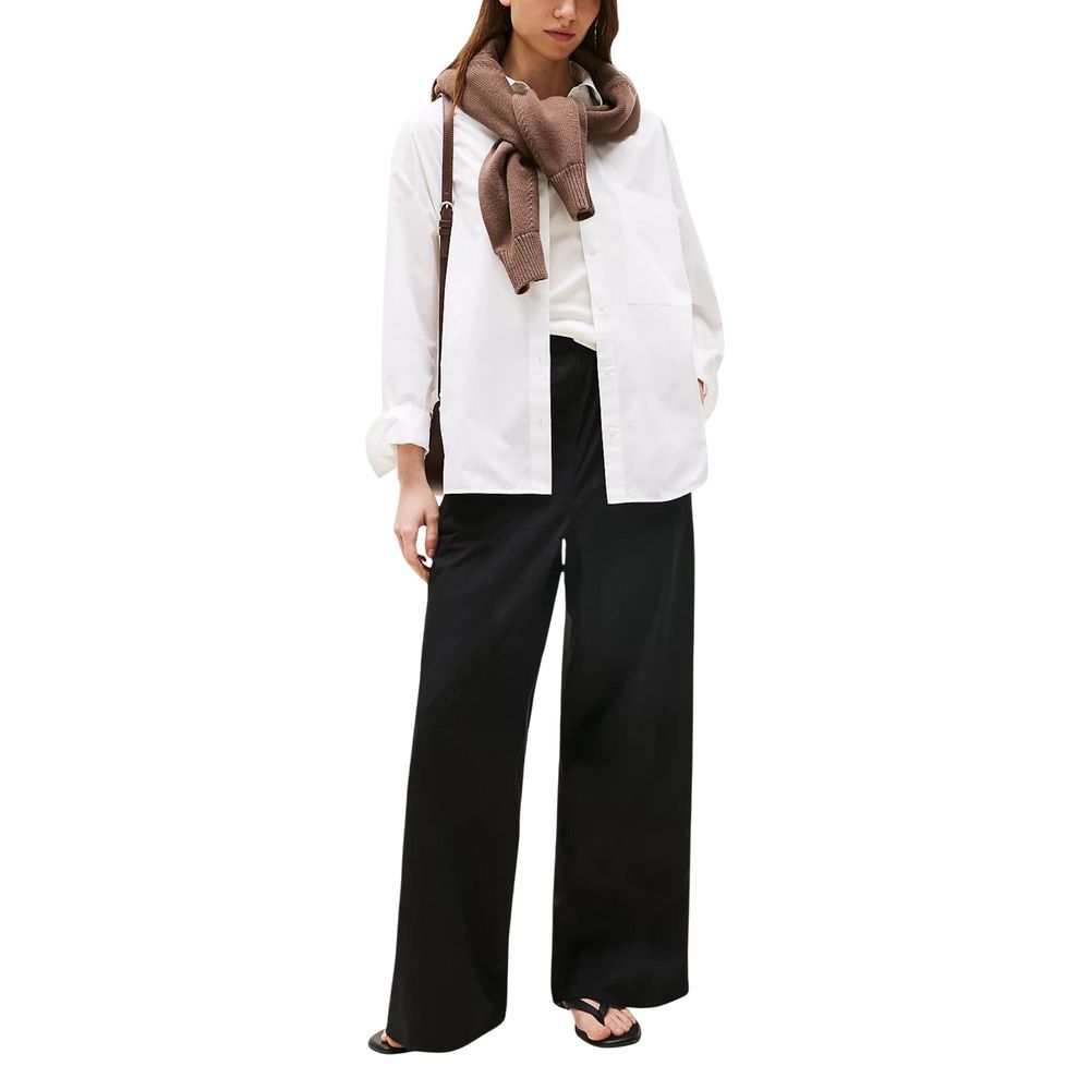 Pantalon décontracté en coton biologique noir de Tommy Hilfiger, coupe confortable et style casual pour homme.