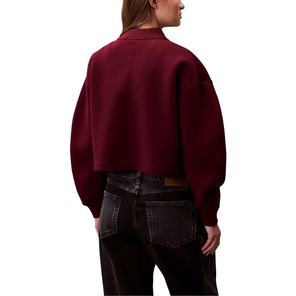 Veste bomber en viscose de couleur bordeaux de la marque Calvin Klein Jeans, vue de face avec détails de couture visibles.