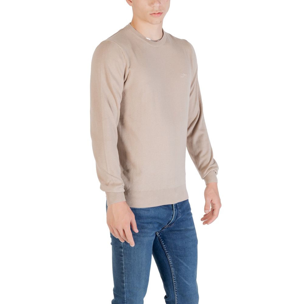 Sweatshirt en polyester beige de Guess, style décontracté avec logo discret, vue de face sur fond neutre.