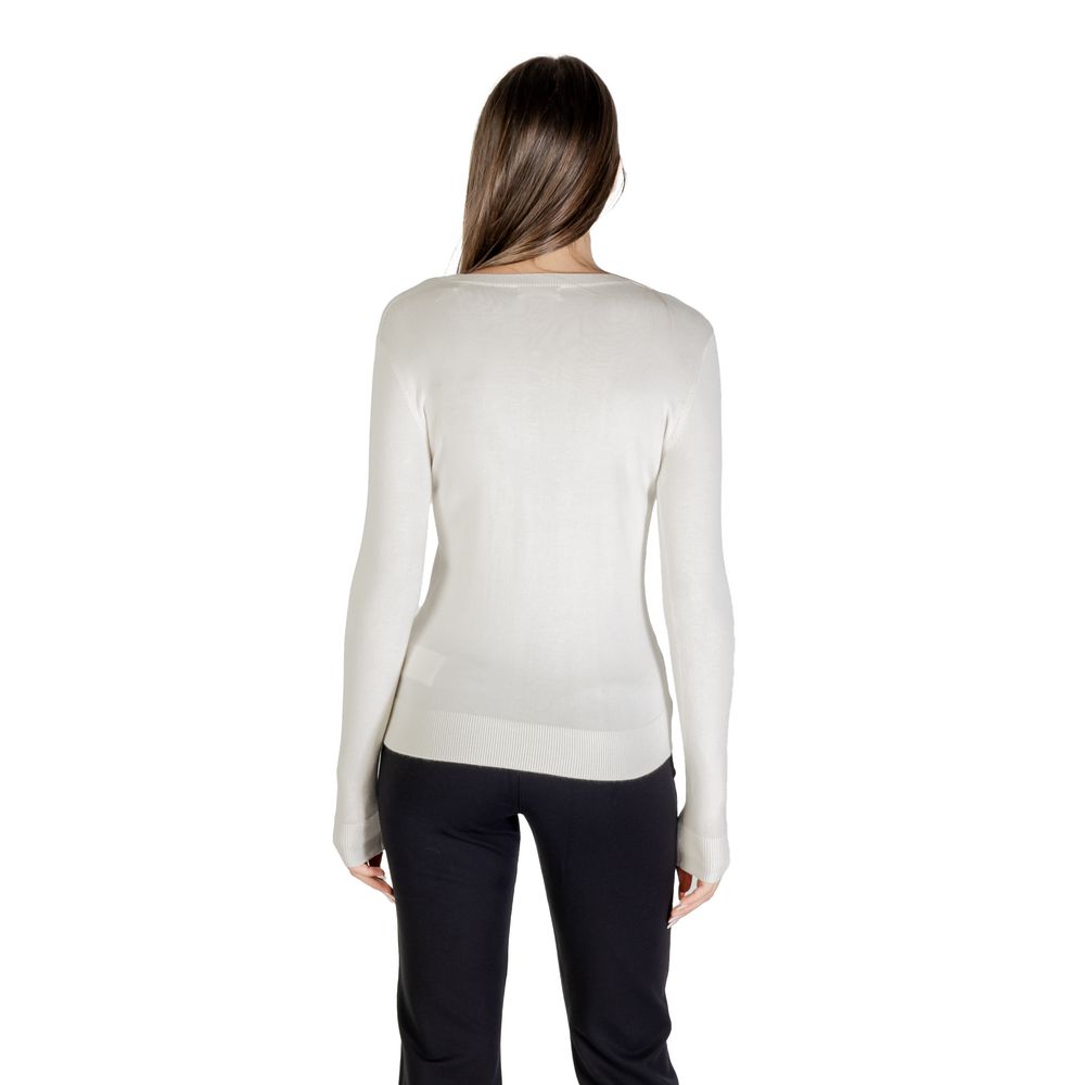 Sweat-shirt Guess crème en viscose avec logo Guess, coupe décontractée et manches longues, idéal pour un style confortable.