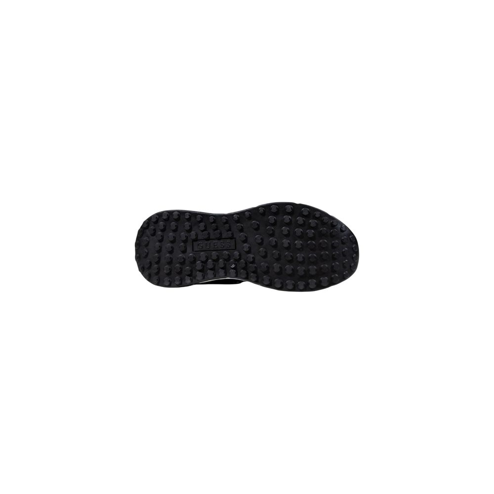 Baskets Guess noires en polyéthylène à semelle épaisse, style chunky, avec design contemporain et détails modernes.