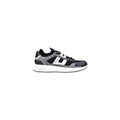 Chaussures de sport bicolores en polyester Armani Exchange, baskets athlétiques modernes avec design dynamique.