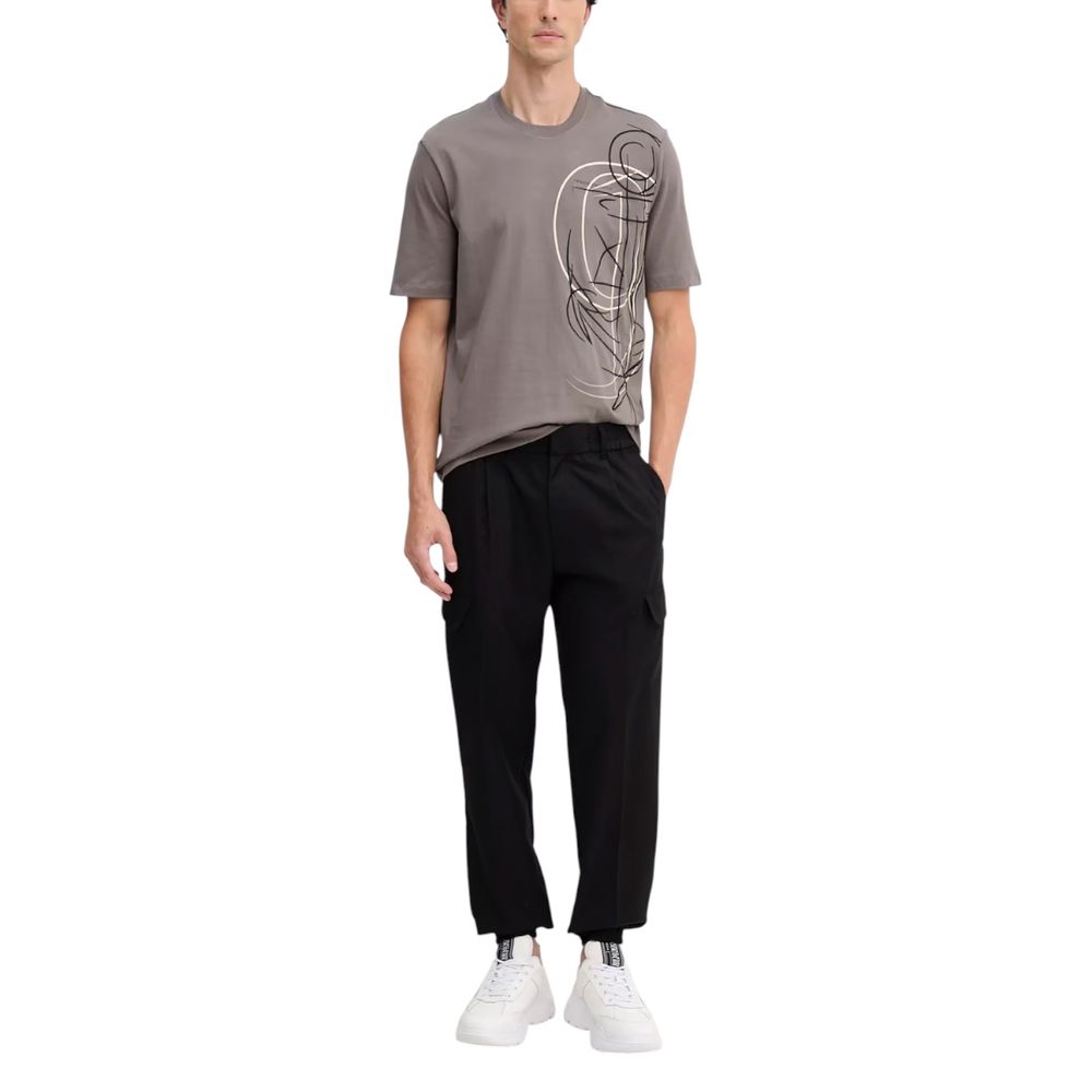 Pantalon décontracté en polyester noir de la marque Armani Exchange, vue de face.