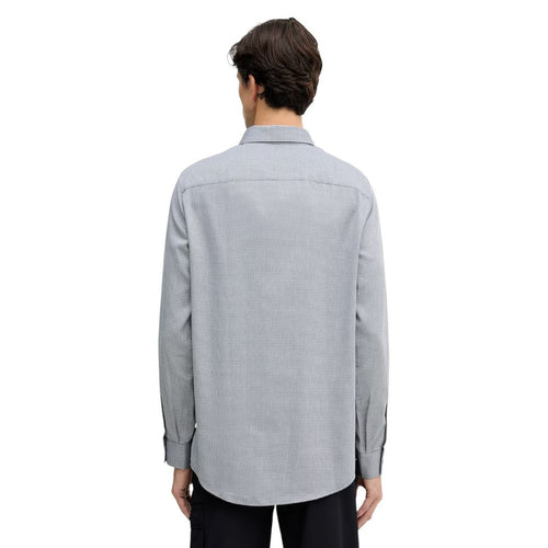 Chemise homme Armani Exchange en coton noir et blanc à manches longues, avec col classique et boutons sur le devant.