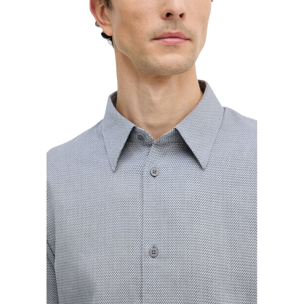 Chemise blanche et noire en coton de la marque Armani Exchange, vue de face, avec col classique et manches longues.