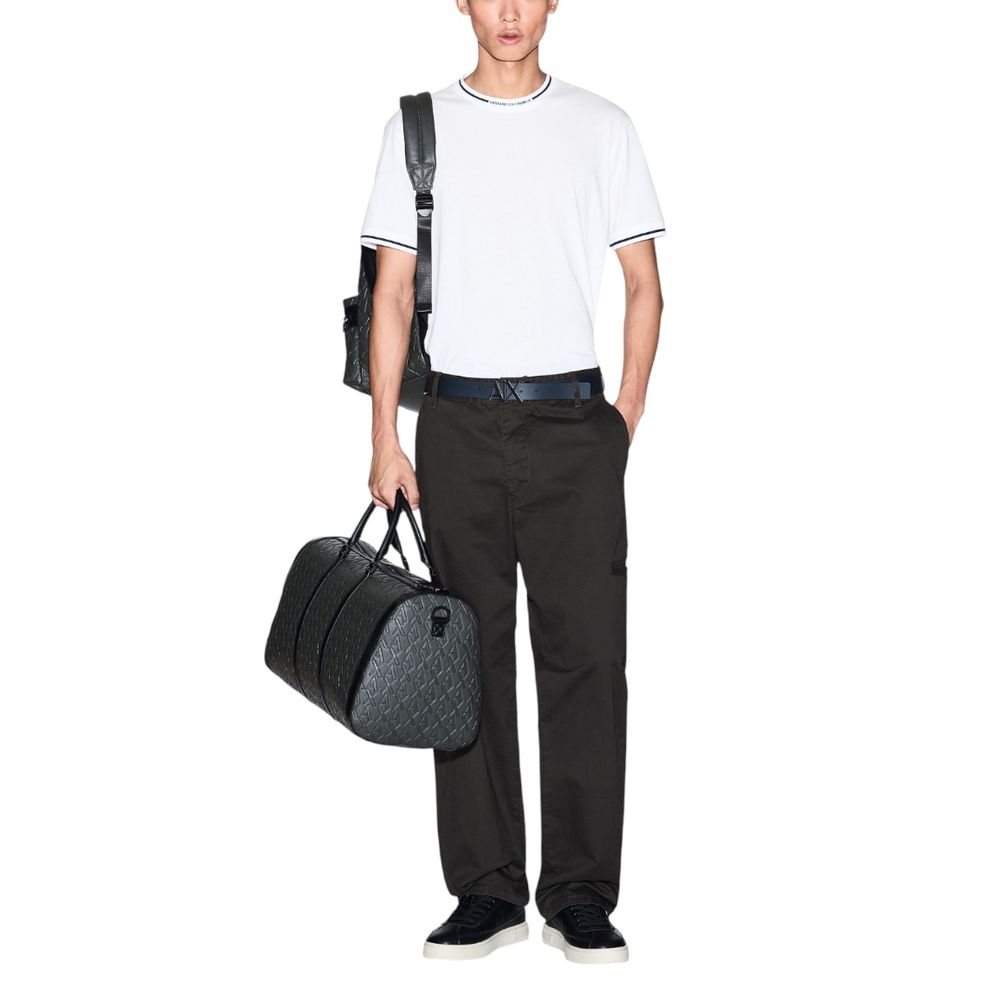 T-shirt blanc en coton Armani Exchange affiché avec col rond et logo discret sur la poitrine, pour un style casual élégant.