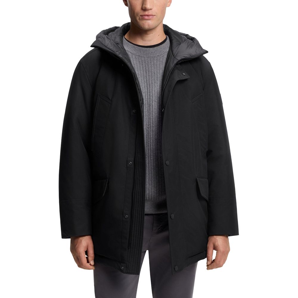 Veste longue en polyester noir de Hugo Boss, coupe élégante, avec fermeture éclair et col montant, vue de face.