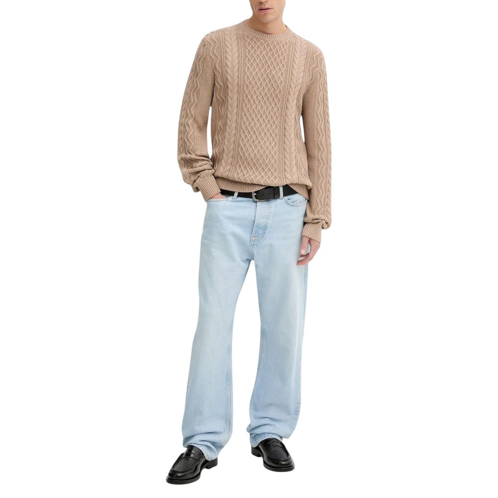 Jean beige Tommy Hilfiger Jeans en coton recyclé, avec détails de sweat-shirt décontracté et style moderne.