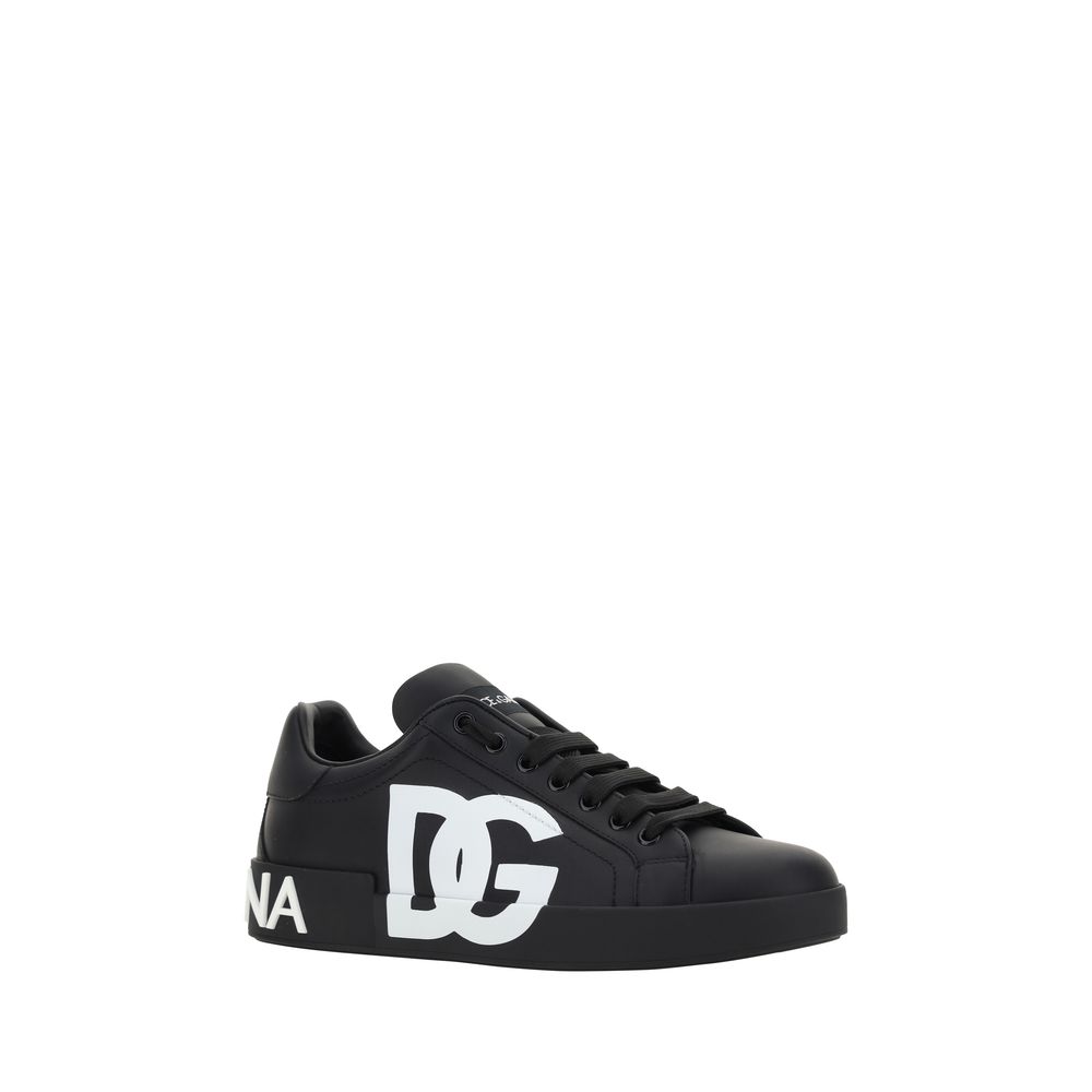 Sneakers noires en cuir de veau Dolce & Gabbana Bos Taurus, style moderne avec détails élégants et design sophistiqué.