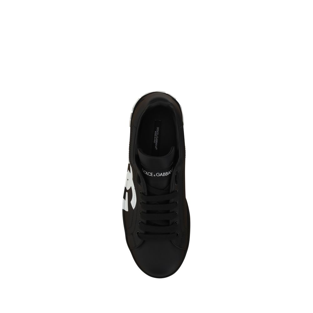 Chaussures sneakers noires en cuir de veau Dolce & Gabbana Bos Taurus avec semelle blanche, vue de face.
