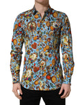 Chemise Dolce & Gabbana en coton bleu avec motif bijoux dorés et boutonnière.