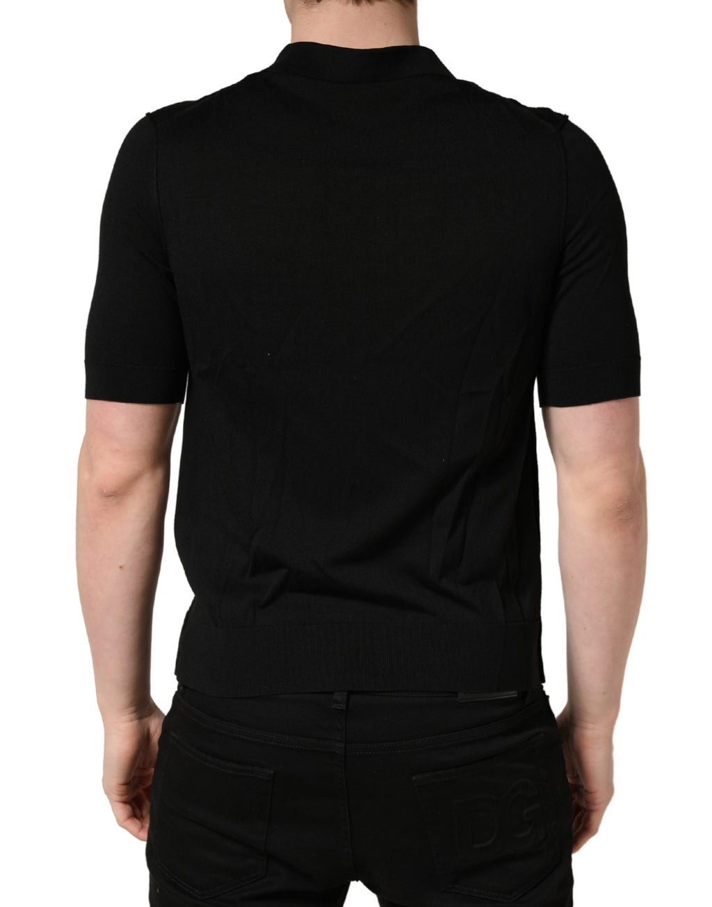 Polo pour homme Dolce & Gabbana en laine noire à manches courtes, style élégant et classique.