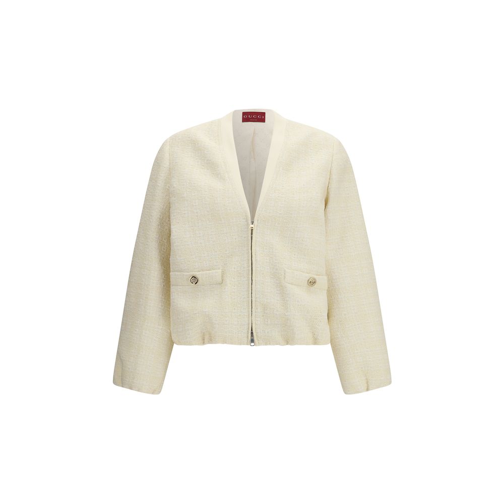 Veste bomber en coton beige de Gucci, avec design élégant et détails sophistiqués, vue sur un mannequin.