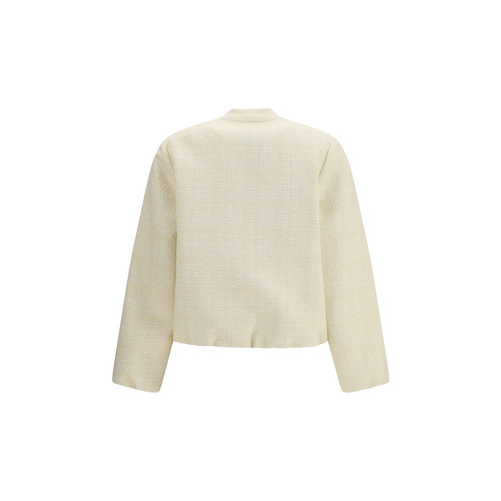 Veste bomber en coton beige de Gucci, avec détails élégants et logo de la marque, vue de face sur un fond neutre.