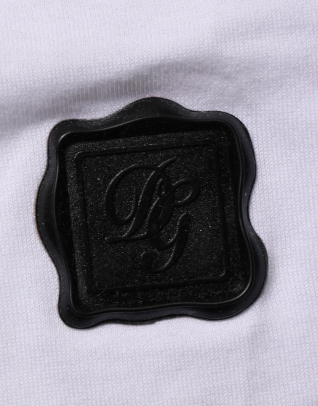 T-shirt blanc Dolce & Gabbana en coton avec logo et col rond, style décontracté.