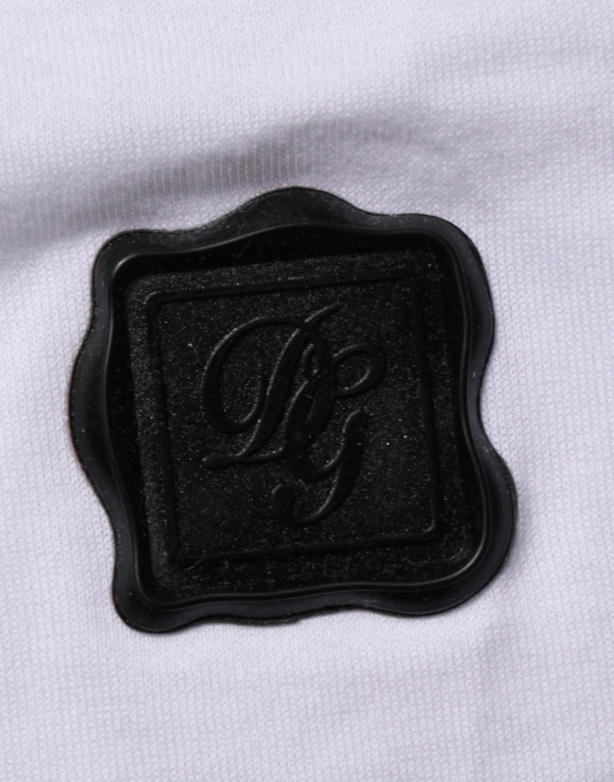 T-shirt blanc Dolce & Gabbana en coton avec logo et col rond, style décontracté.