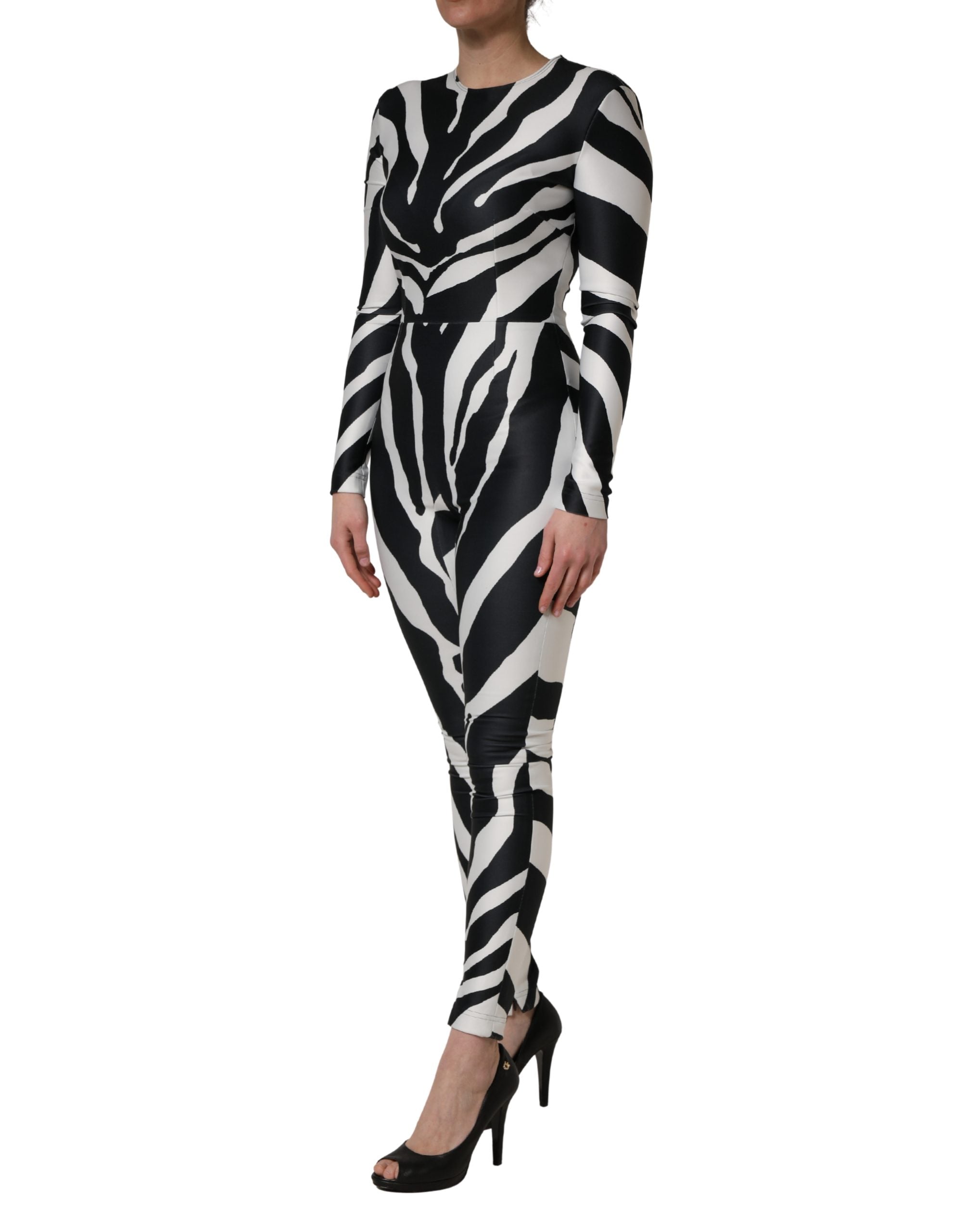 Combinaison Dolce & Gabbana en polyester noir et blanc à motif zèbre, ajustée avec col en V et manches longues.