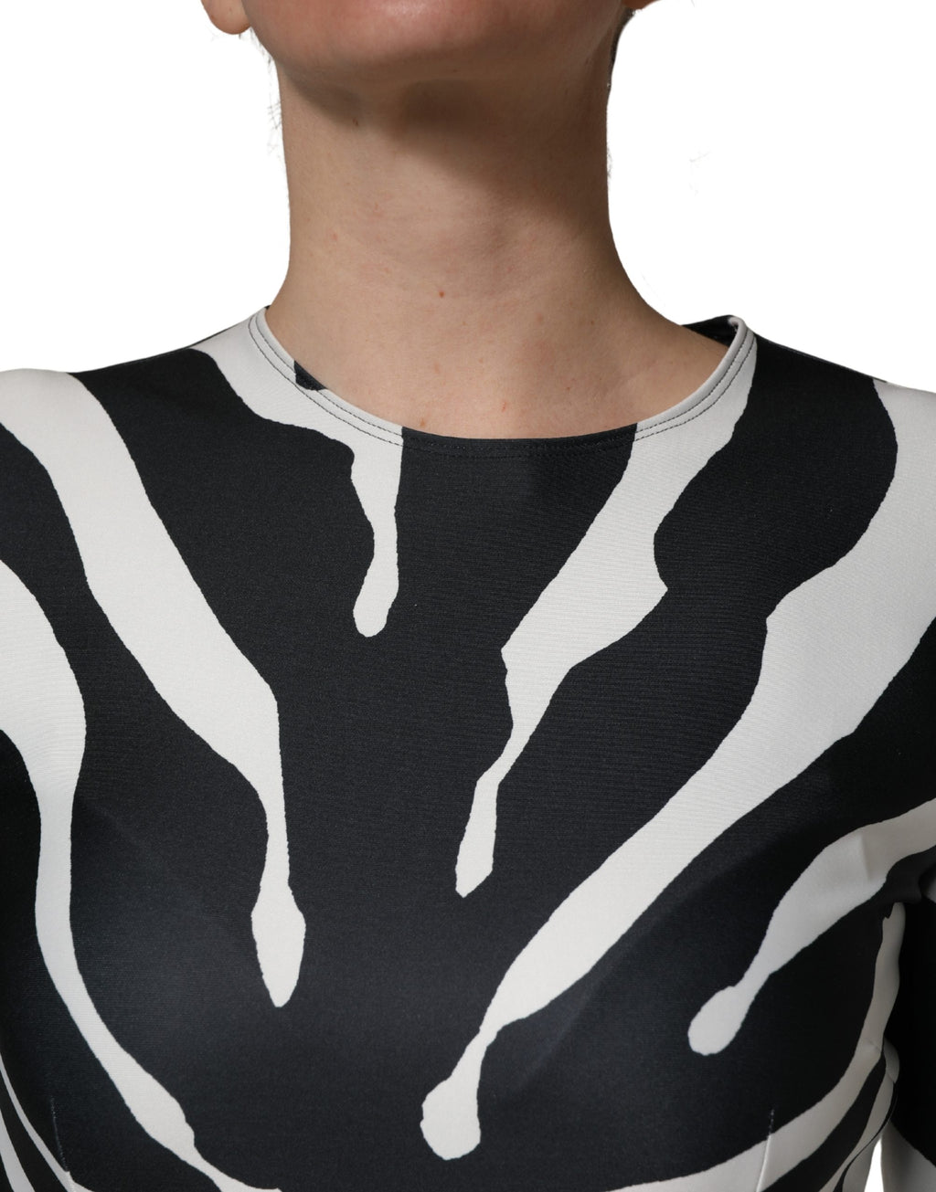 Combinaison en polyester noire et blanche à motif zèbre de Dolce & Gabbana, style élégant et audacieux.