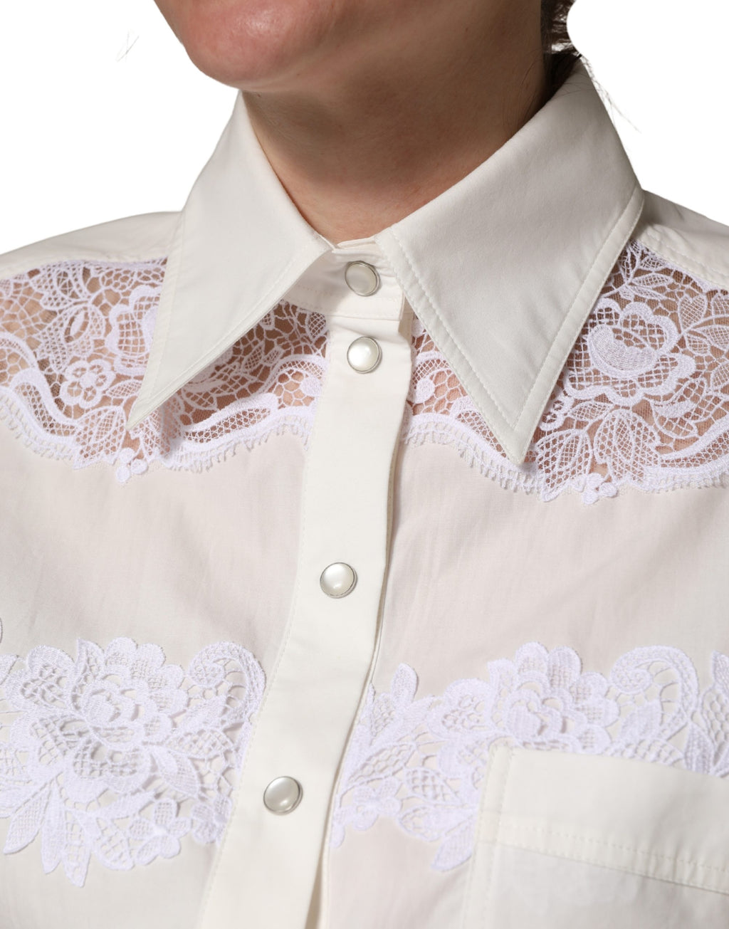Combinaison longue Dolce & Gabbana en coton blanc avec bordures en dentelle et manches longues élégantes.