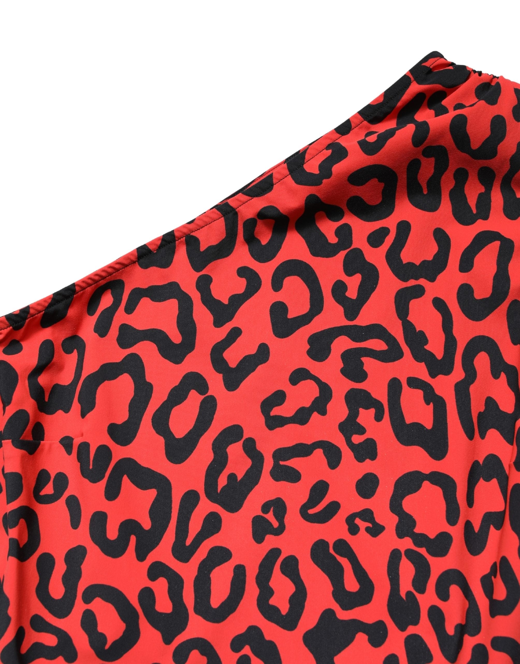 Combinaison en nylon noir et rouge à motif léopard, signée Dolce & Gabbana, élégante et tendance.