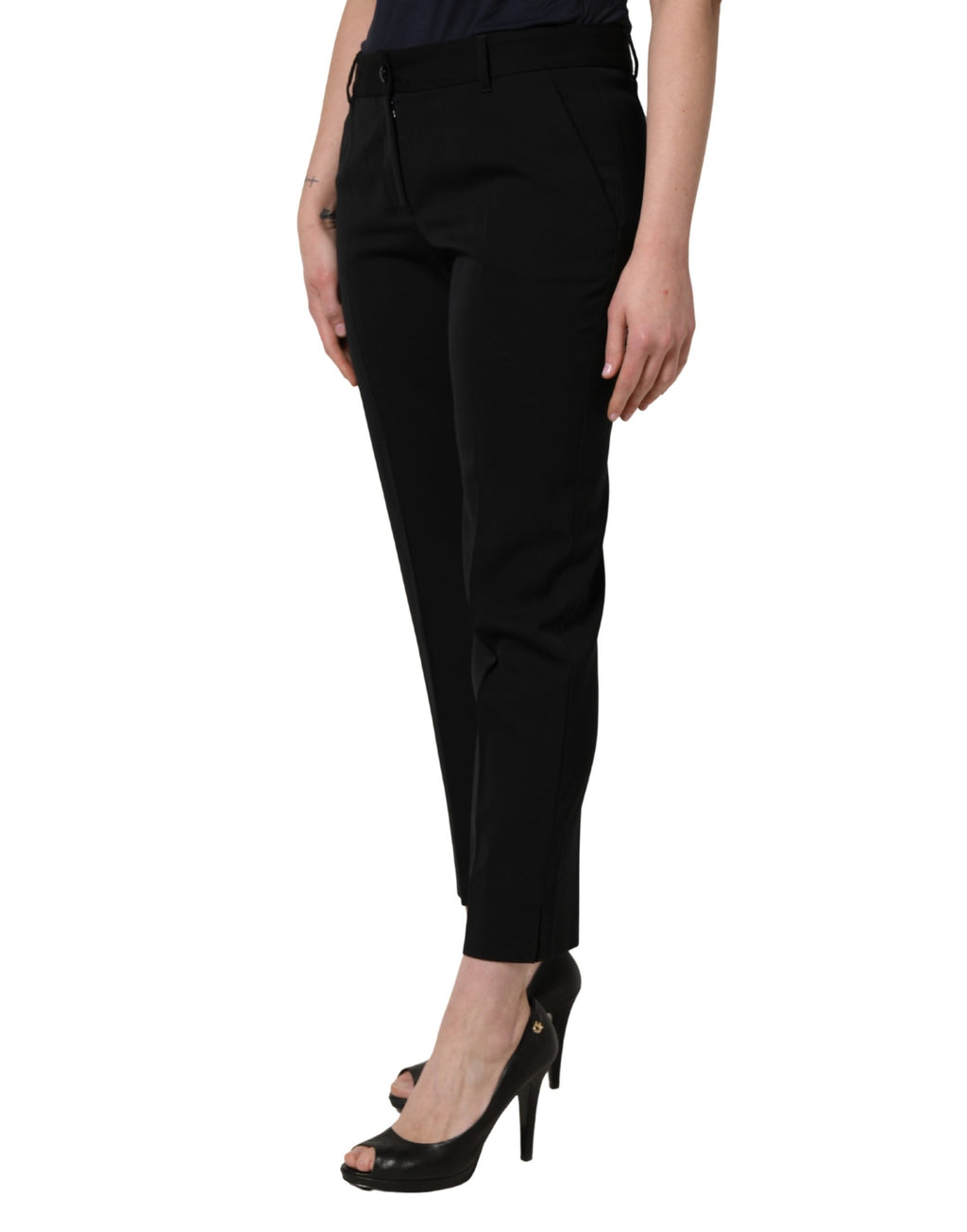 Pantalon noir en laine Dolce & Gabbana, taille haute, cropped et fuselé, vue de face sur un fond blanc.