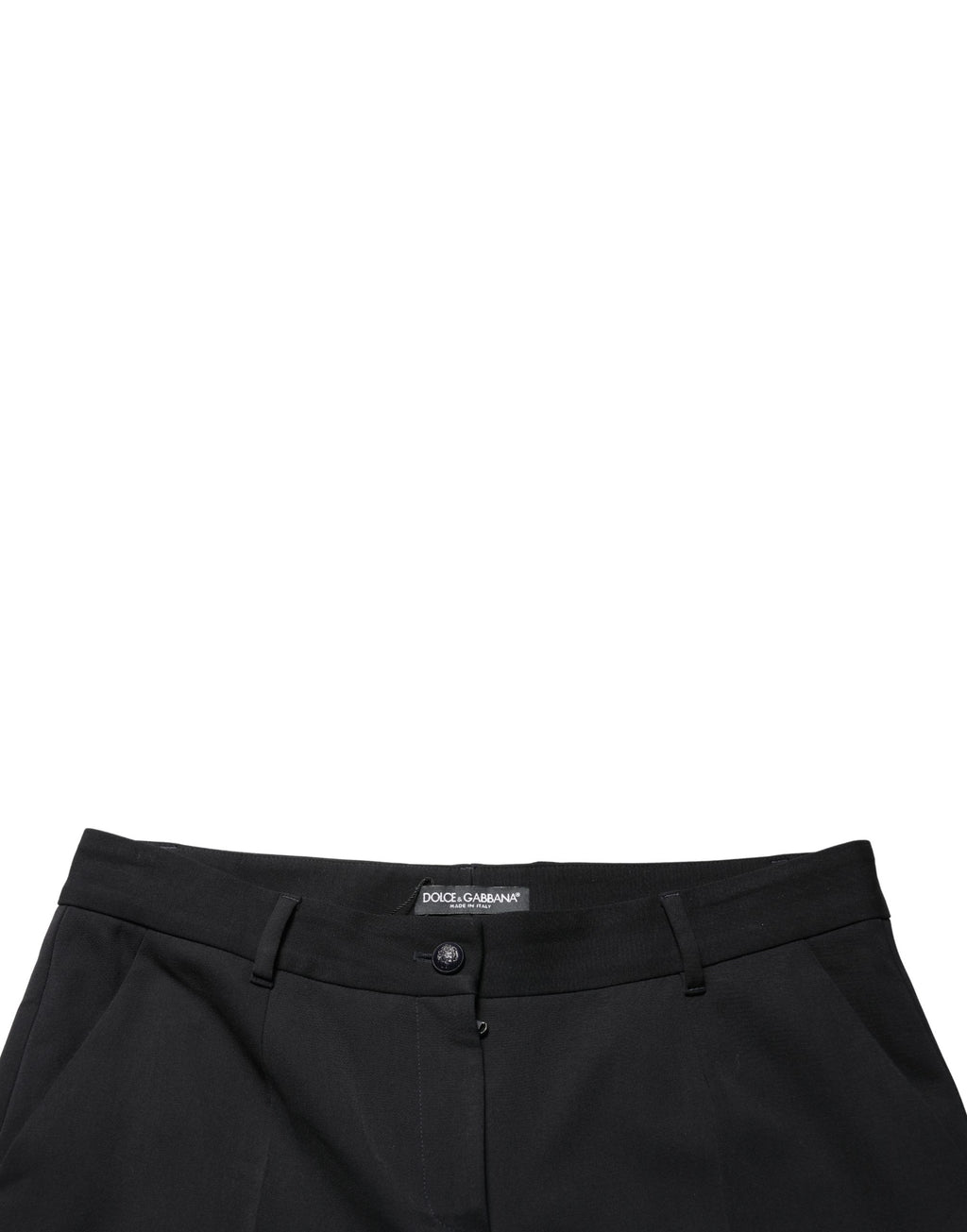 Pantalon noir en laine Dolce & Gabbana, taille haute, cropped et tapered, vue de face sur fond blanc.