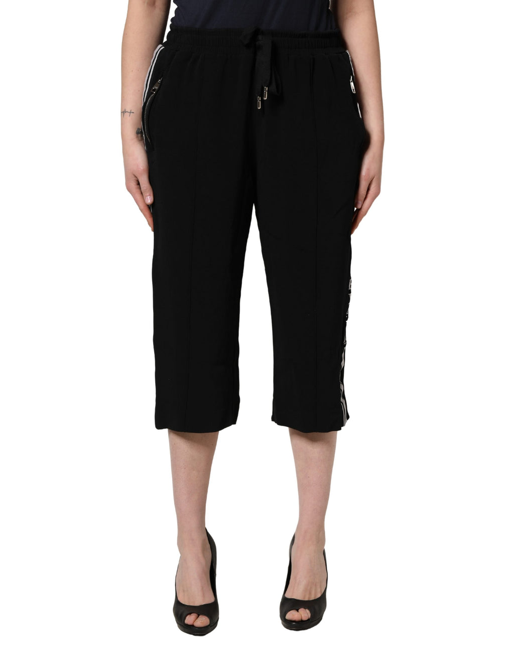 Pantalon femme noir en viscose Dolce & Gabbana, taille mi-haute et coupe cropped, vue de face.