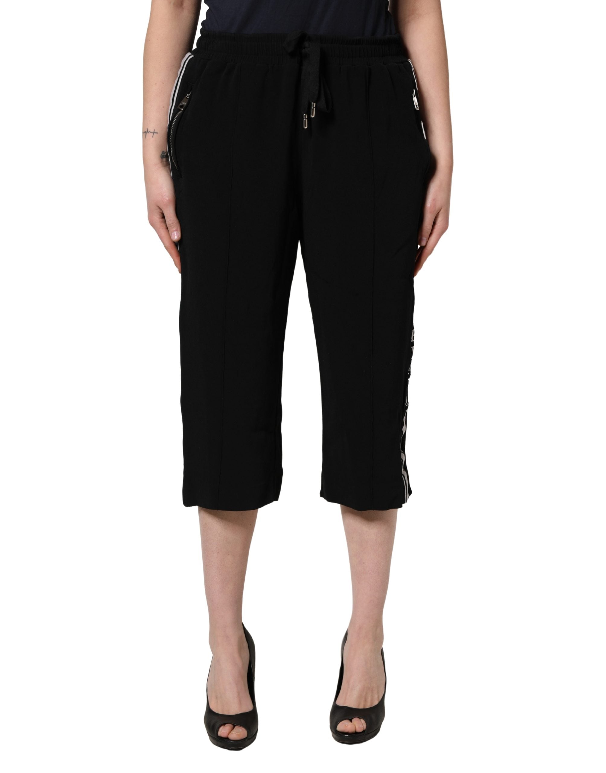 Pantalon femme noir en viscose Dolce & Gabbana, taille mi-haute et coupe cropped, vue de face.