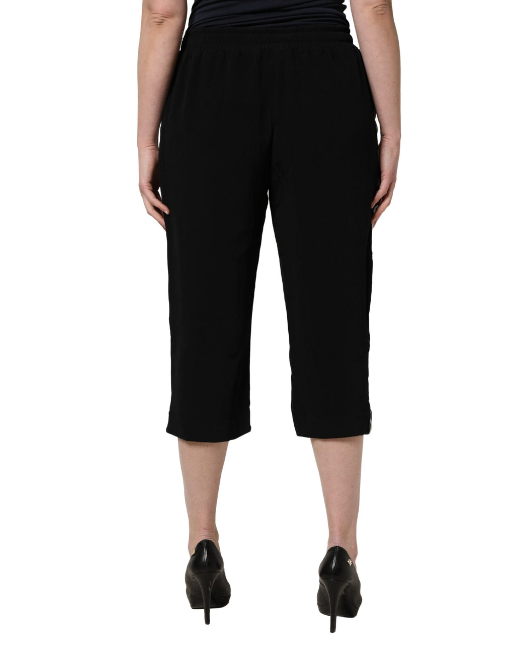 Pantalons pour femmes Dolce & Gabbana en viscose noire, coupe mi-hauteur et taille mi, cropped et élégants.