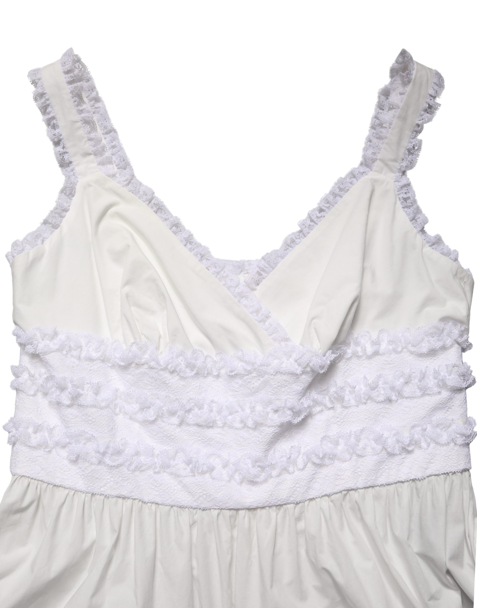 Robe longue blanche en coton sans manches avec dentelle, conçue par Dolce & Gabbana, élégante et féminine.