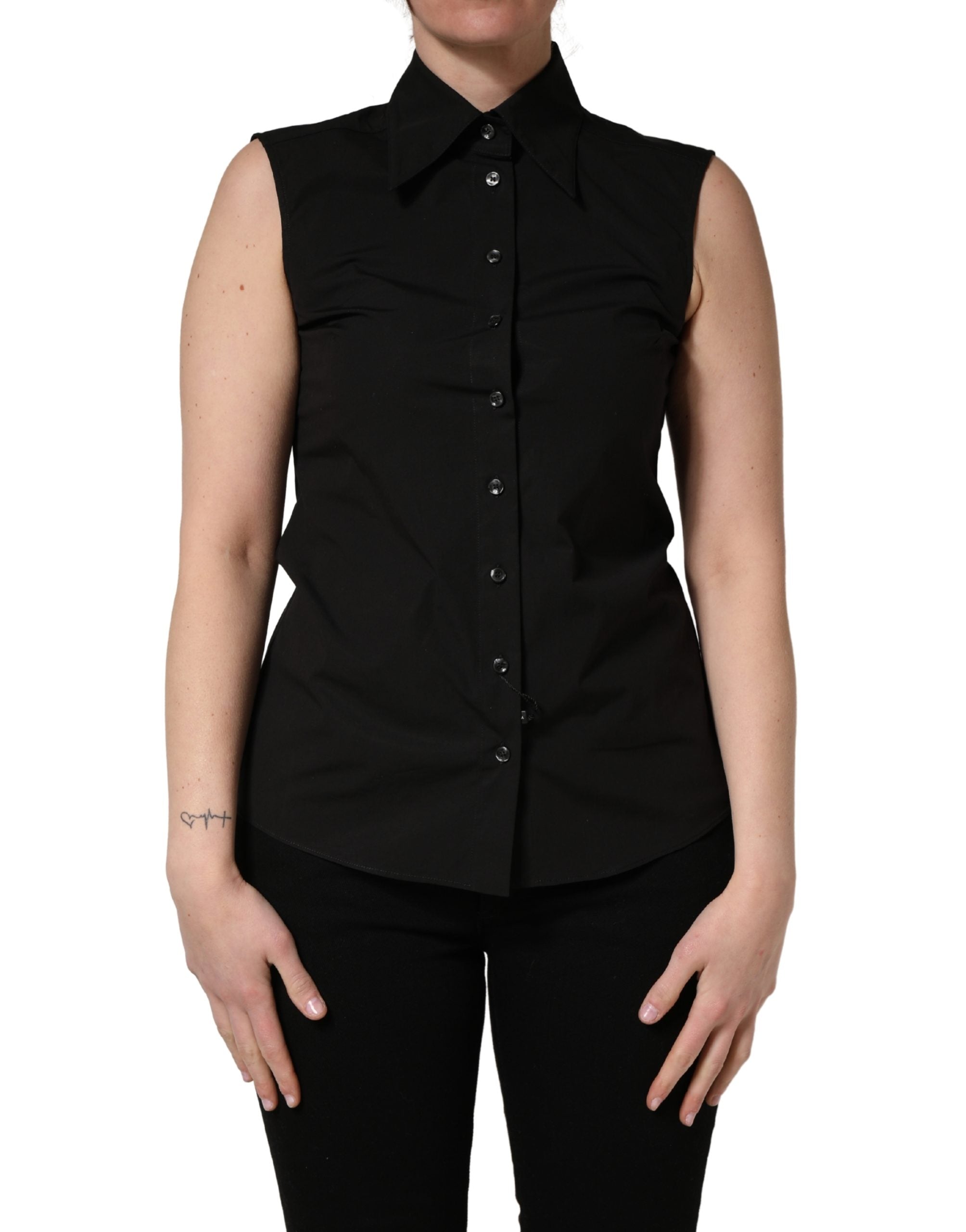 Haut sans manches en coton noir Dolce & Gabbana avec col et boutons, vue de face.
