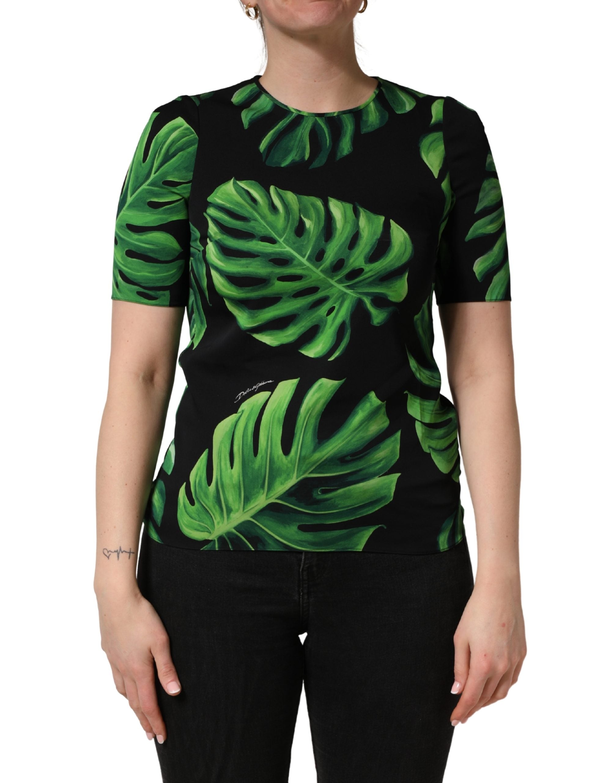 Chemisier en soie noir Dolce & Gabbana avec imprimé de philodendron, manches longues et coupe élégante.